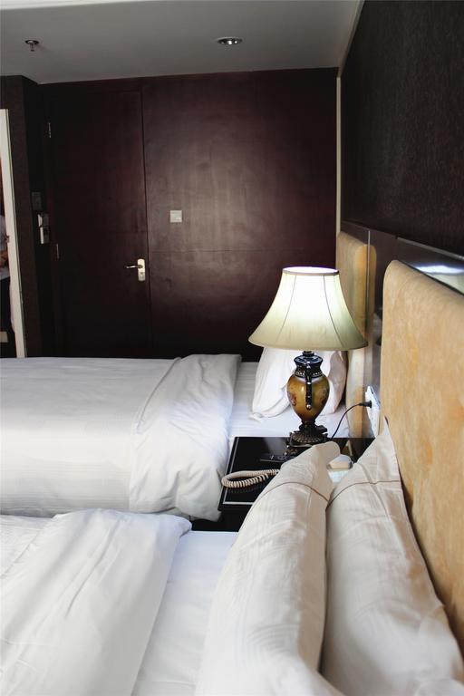 Manhattan Jinling Hotel Sanghaj Szoba fotó
