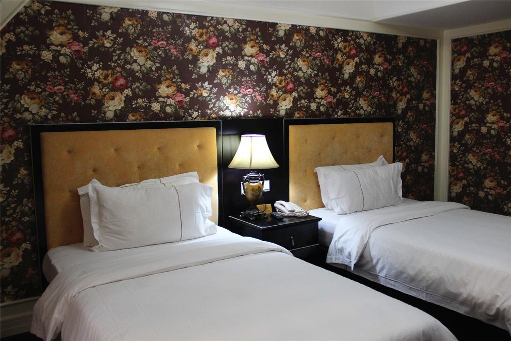 Manhattan Jinling Hotel Sanghaj Szoba fotó