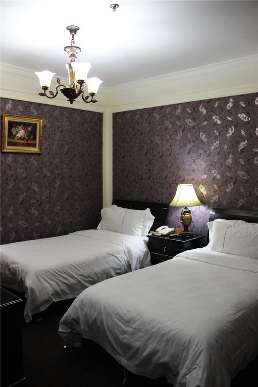 Manhattan Jinling Hotel Sanghaj Szoba fotó