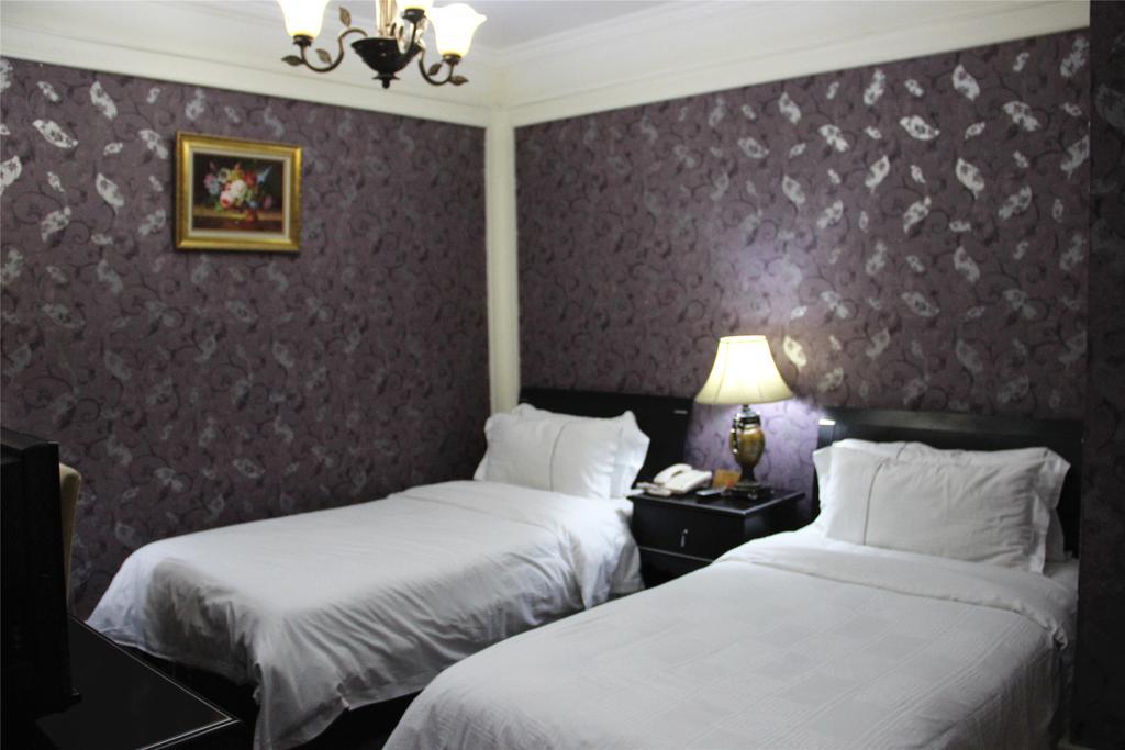 Manhattan Jinling Hotel Sanghaj Szoba fotó